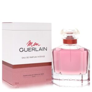 בקבוק בושם "Mon Guerlain" עם אריזת קרטון, ניחוח אינטנסיבי, 100 מ"ל, בעיצוב אלגנטי בצבעים ורודים ושקופים.