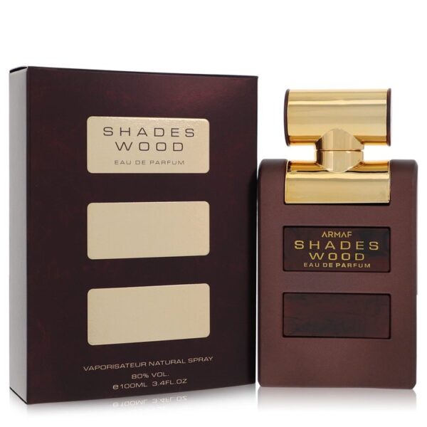 בקבוק בושם ארמאף Shades Wood עם עיצוב אלגנטי, מכיל 100 מ"ל של Eau de Parfum. הבושם מציע ניחוח עץ ייחודי, מתאים לגברים ולנשים.