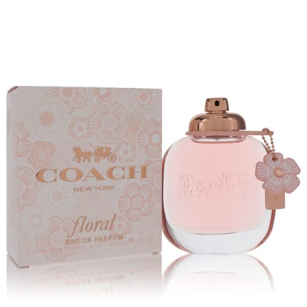 בקבוק בושם של Coach New York, סדרת Floral, עם עיצוב אלגנטי ופרחוני. הבושם מגיע בתוך קופסה מעוצבת עם דוגמאות פרחים, בנפח 90 מ"ל.