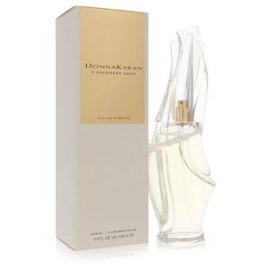בקבוק בושם של דונה קארן, Cashmere Mist, עם עיצוב מודרני ומלוטש. הבושם הוא Eau de Parfum בנפח 100 מ"ל, מציע ניחוח ייחודי ונעים.