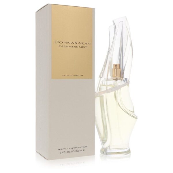 בקבוק בושם של דונה קארן, Cashmere Mist, עם עיצוב מודרני ומלוטש. הבושם הוא Eau de Parfum בנפח 100 מ"ל, מציע ניחוח ייחודי ונעים.